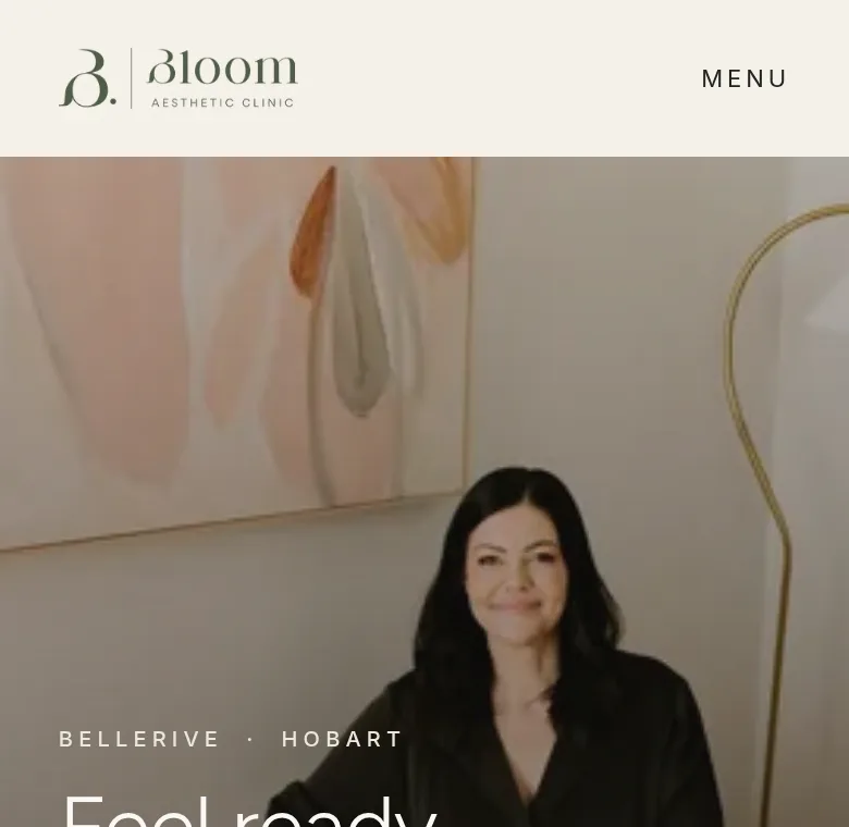 Bloom Aesthetic Clinic homepage on a phone